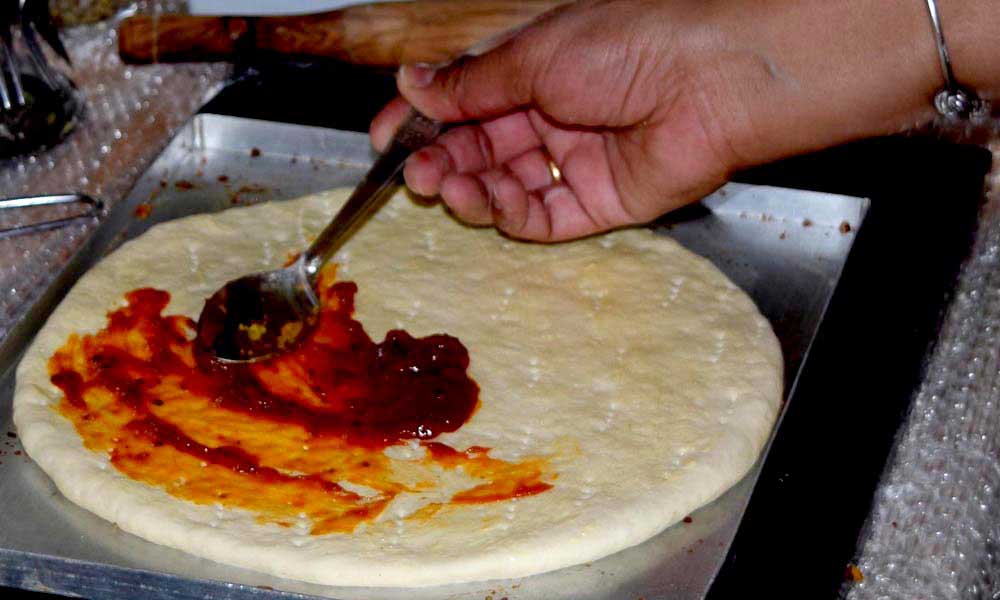 Whole-Wheat-Pizza-dough-base-with-pizza-sauce whole wheat pizza dough base with pizza sauce